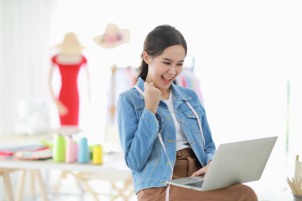istock Female fashion designer use notebook computer. 1222323675
