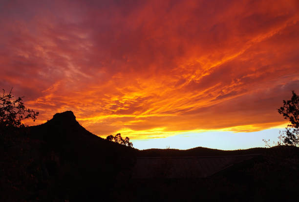 Fiery Sky Over Thumb Butte stock photo