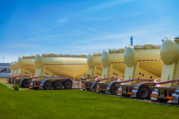 istock Cement tankers line up in front of the grass 1222336906
