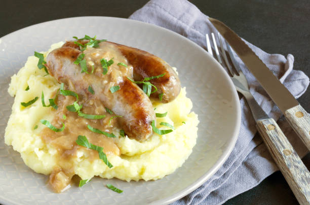 istock English sausages with mashed potatoes and gravy. 1222350568