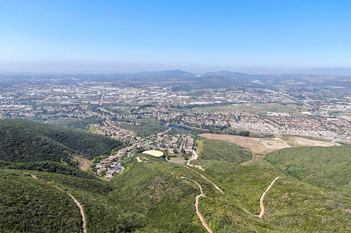 Aerial view of Double Peak Park in San Marcos. 200 acre park featuring a play area and hiking trails that lead to a summit.