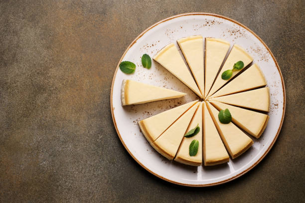 istock Classic vanilla cheesecake cut into pieces. Top view, copy space 1222359766