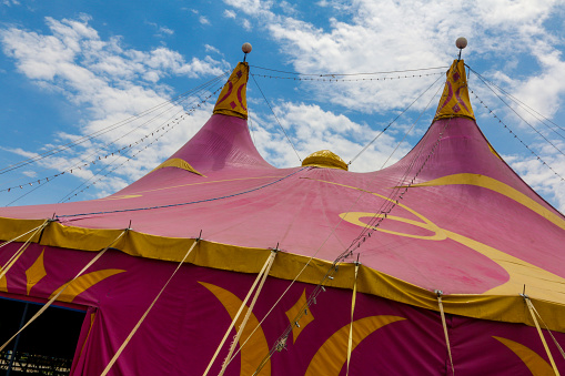 Circus Horizontal design and festival background with blank space as a big top tent carnival fun and entertainment icon for a theatrical party festival isolated on a white background as a 3D render.