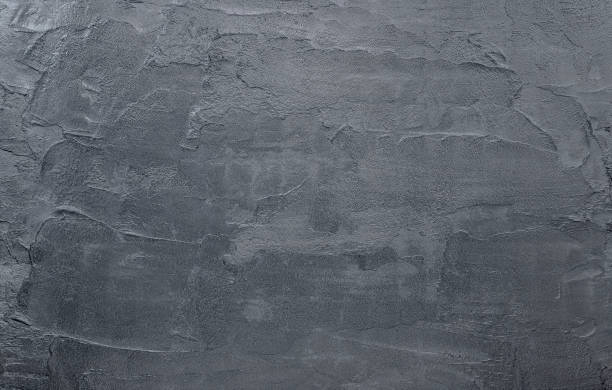 istock Dark black concrete wall texture background. Natural black slate concrete  background pattern. 1222363880