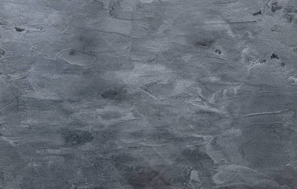 istock Dark black concrete wall texture background. Natural black slate concrete  background pattern. 1222364279