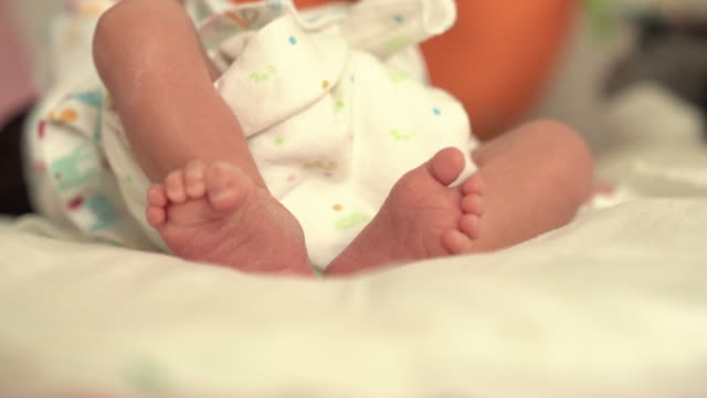 close up of newborn baby feet