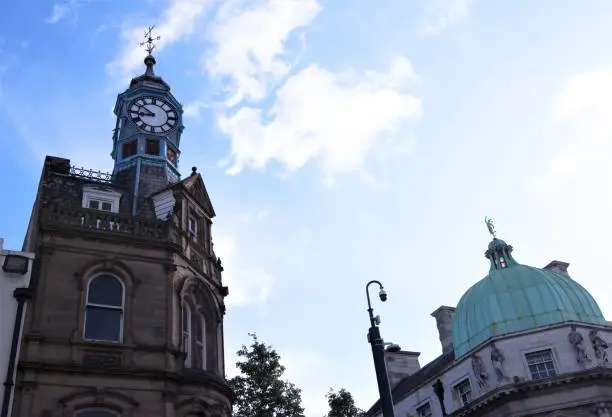 Photo of Clock tower and dome, in Doncaster town centre; 100,000 tests deadline.