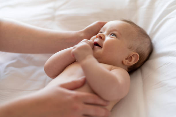 istock Loving mother touching baby 1222366801