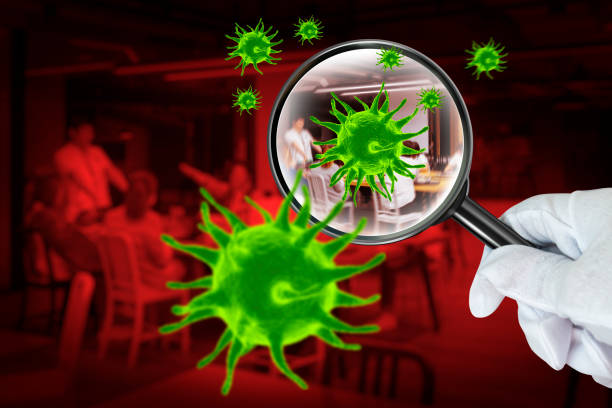 istock 3Coronavirus 2019.D simulation of viruses inside the air by showing through a magnifying glass,Checking virus in office workplace. 1222368643