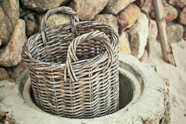 istock empty wicker basket near stones 1222369779
