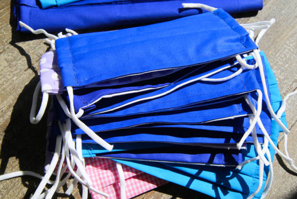 istock View on pile homemade sewed themselves cloth protective face masks 1222371602