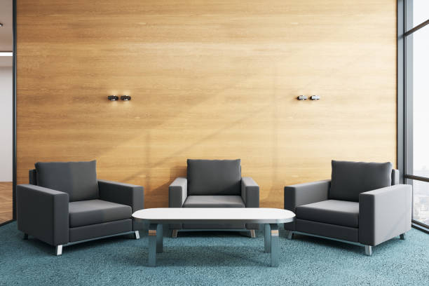 istock Modern waiting room with chairs and blank wooden wall. 1222372131