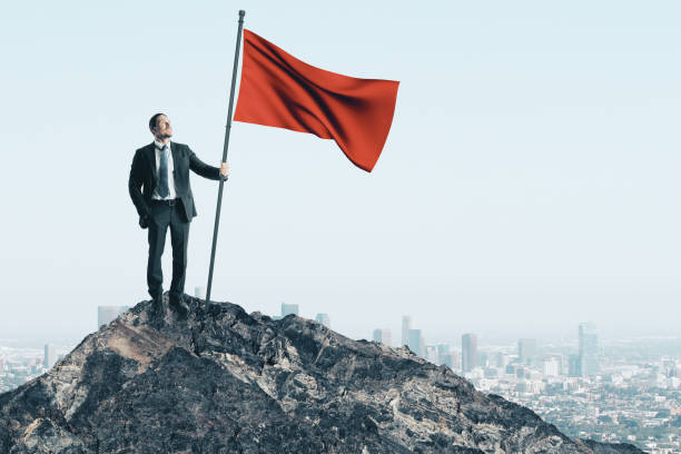 istock Businessman with flag 1222372898