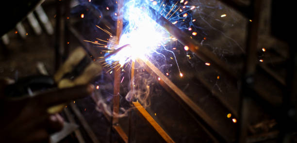 istock Metal welding. Sparks from electric heating. Iron, materials.Artistic welding sparks light, industrial background . 1222373151