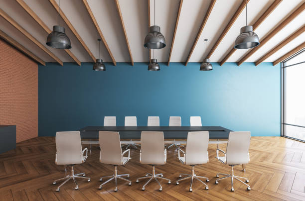 istock Modern meeting room interior with blank blue wall. 1222373274