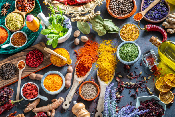 istock Spices herbs condiments seasoning on grunge gray background 1222373677