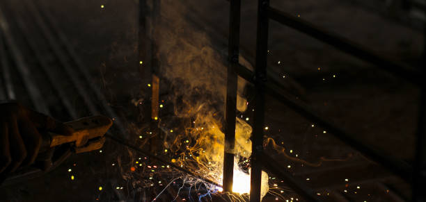 istock Metal welding. Sparks from electric heating. Iron, materials.Artistic welding sparks light, industrial background . 1222374369