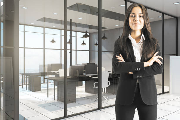 istock Smiling businesswoman in modern office 1222374461