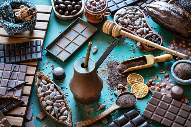 istock Assorted chocolate cocoa beans and pod chocolate bars spices nuts 1222376271