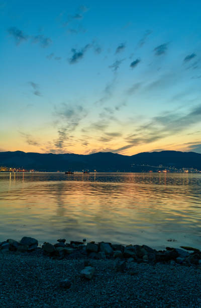 istock Dawn over the sea and mountains 1222377114
