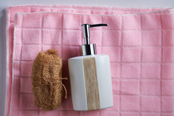 istock soap dispenser loofah and towel 1222381021