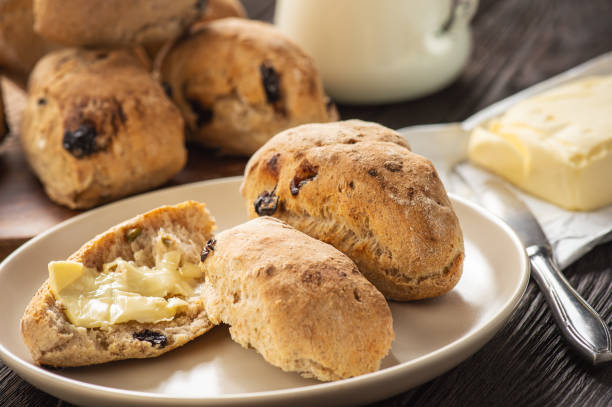 istock Homemade whole wheat bread buns with raisins. 1222381167