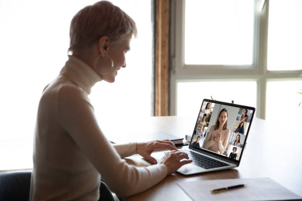 istock Female employee have webcam conference with diverse colleagues 1222388014