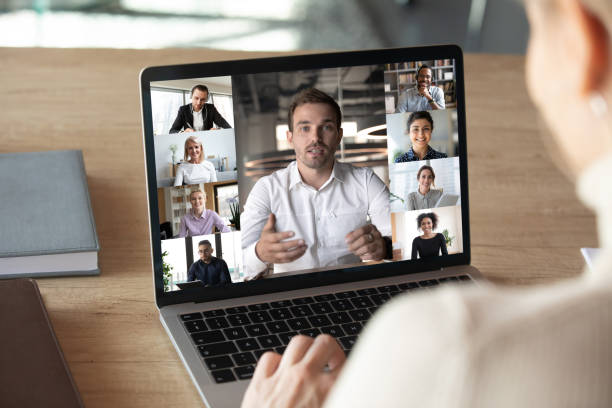 istock Female employee talk on video call with diverse colleagues 1222389475