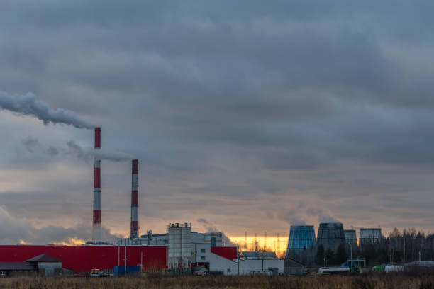 istock Smoking factory chimneys against the sunset. Environmental pollution 1222389744