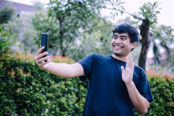istock Young Southeast Asian Man Making a Video Call 1222390694