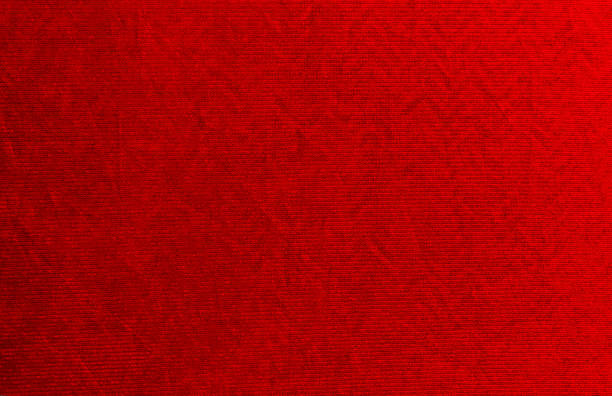kitchen towel with red checkered pattern, and a striped pattern at the left sides, close-up