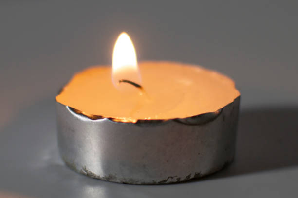 istock Wax diya lamp on full space with burning brightly 1222391879