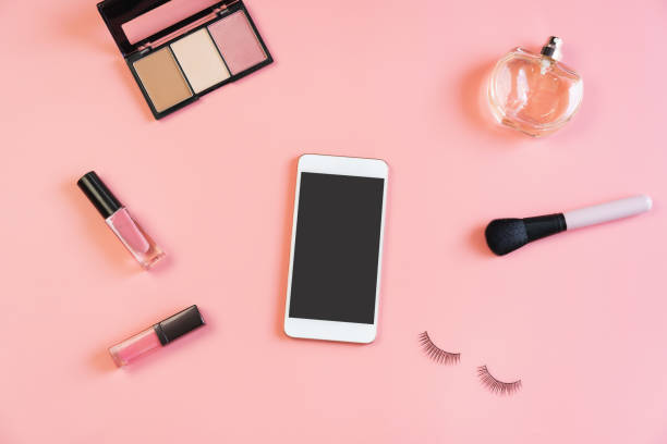 istock Woman cosmetics and make up with empty screen smartphone and copy space, Top view 1222392334