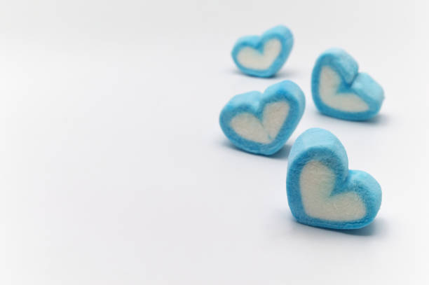 istock Blue sweet heart shape marshmallow isolated on white background. 1222394167