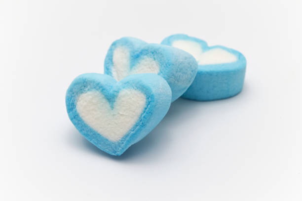 istock Blue sweet heart shape marshmallow isolated on white background. 1222394185
