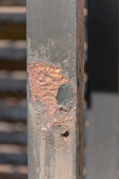 istock a close up view of a pole that has rusted in the middle 1222395210