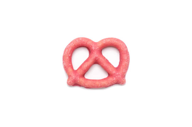 istock Pretzel biscuit with strawberry cream coated on white background. 1222398122