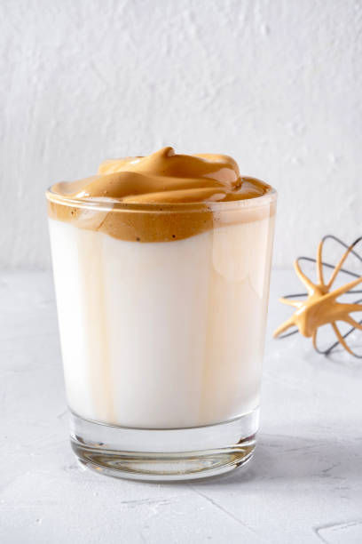 istock Dalgona Coffee. Milk topped with whipped instant coffee. 1222401657