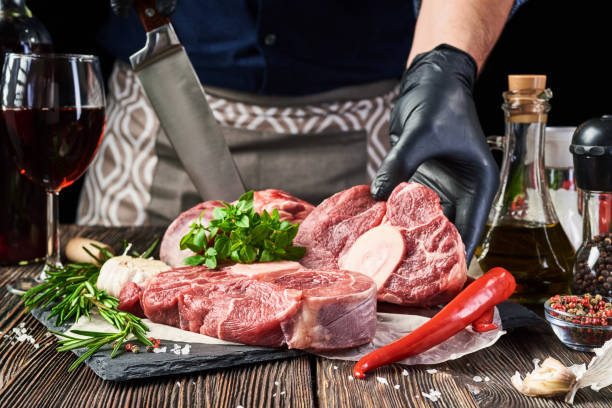 istock Fresh meat on a wooden background 1222401659