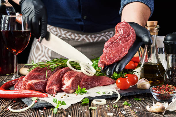 istock Fresh meat on a wooden background 1222401749