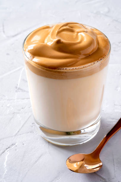 istock Dalgona Coffee. Milk topped with whipped instant coffee. 1222401753