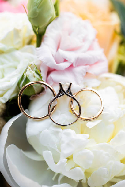 istock Wedding rings at the wedding bouquet 1222403646