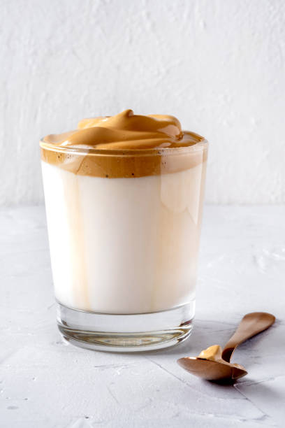 istock Dalgona Coffee. Milk topped with whipped instant coffee. 1222404369