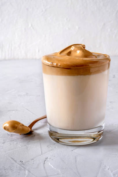 istock Dalgona Coffee. Milk topped with whipped instant coffee. 1222404650