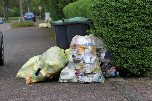 Garbage is waiting for the removal on the street