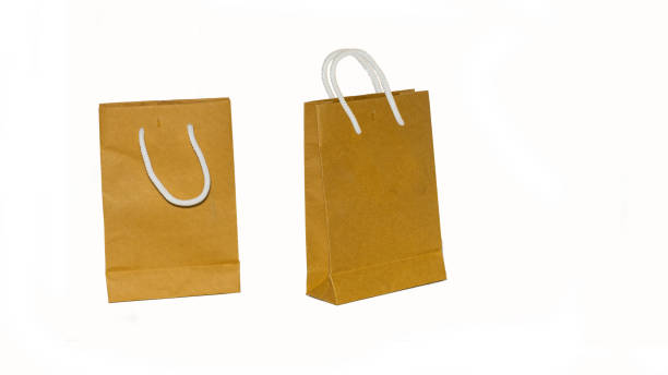 istock 2 brown paper bags with a white background 1222406032