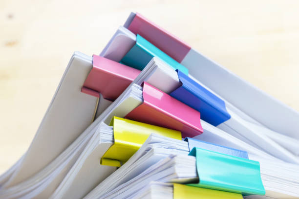 istock pile of papers at work office for business on the table, concept document in work office 1222412466