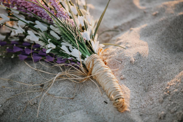 Wedding bouquet on the beach stock photo