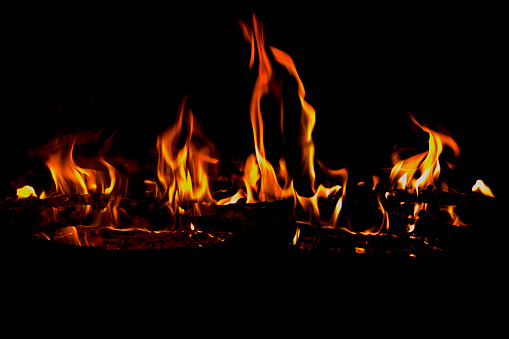 Red hot flames of fire isolated on black