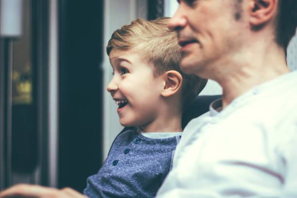 istock Happy boy having fun with his father at home. 1222416766